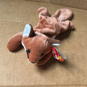 Ty beanie baby. Fox. “Sly” Great condition. Tag still attached.